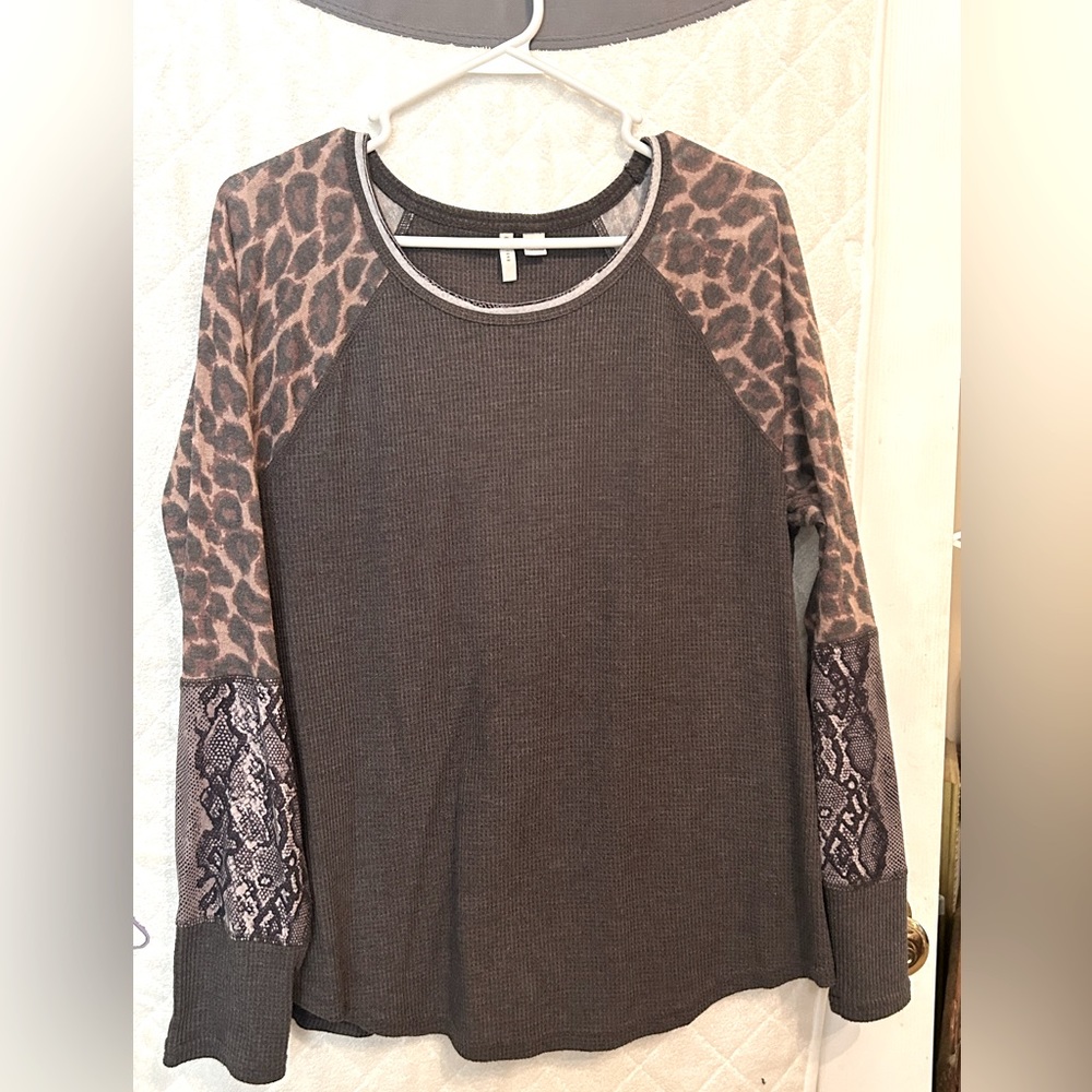 Gray top with patterned sleeves